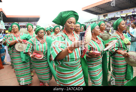 Nigerian women showcasing their traditional attire in paying homage to the traditional ruler of Ijebu Land during the Ojude Oba Festival in Nigeria. Stock Photo