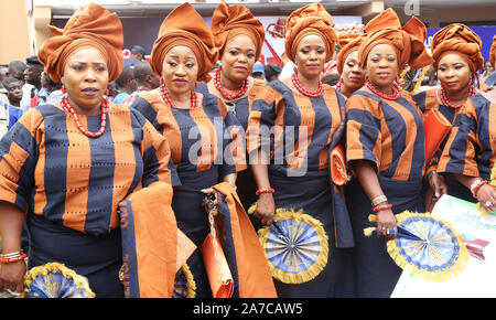 Nigerian women showcasing their traditional attire in paying homage to the traditional ruler of Ijebu Land during the Ojude Oba Festival in Nigeria. Stock Photo