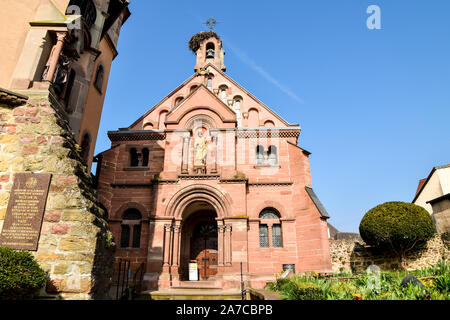 Eguisheim, France - March 24, 2019: The Château Saint-Léon (St. Leo) with church is a former castle in the commune of Eguisheim. Stock Photo