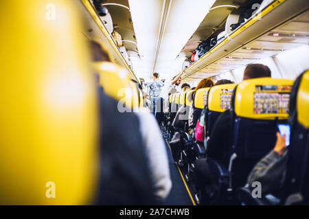 Paris, France - October 06, 2019: Passengers on board a Ryanair airliner - low cost flight Stock Photo