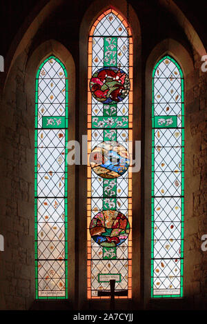 The Gilbert White memorial window, in the south aisle of St. Mary's Church, Selborne, Hampshire Stock Photo