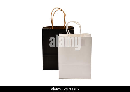 Black and white paper kraft gift bags isolated on white background Stock Photo