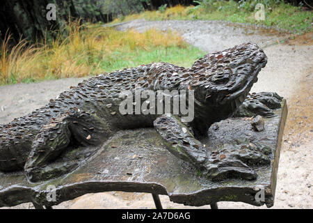 Lizard Sculpture Embedded With Coins, Beacon Fell Country Park, Lancashire, UK Stock Photo