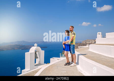 Love story of a beautiful couple on the island of Santorini, Greece Stock Photo