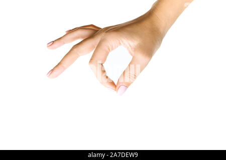 Female hand holding a virtual card with your fingers on a white background Stock Photo