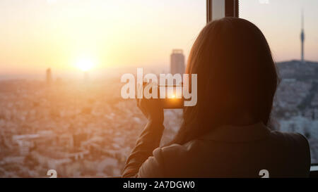 Silhouette Of Woman Taking A Pictures Of Panoramic City View At Sunset On Phone She Is Standing Near The Window With Panoramic City View In Her Modern Apartment In Skyscraper Selective Focus On Girl Stock Photo Alamy Silhouette Of Woman Taking A Pictures Of Panoramic City View At Sunset On Phone She Is Standing Near The Window With Panoramic City View In Her Modern Apartment In Skyscraper Selective Focus On Girl Stock Photo Alamy