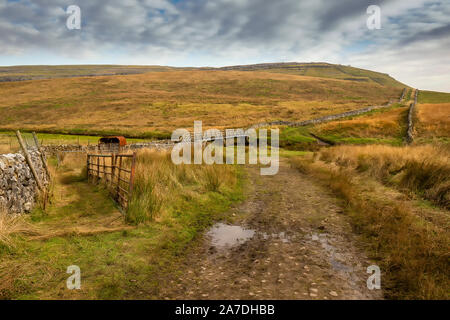 Scar End is a settlement on the side of Twistleton Scar in the English county of North Yorkshire. It is surrounded by Ingleborough and Whernside 2 of Stock Photo