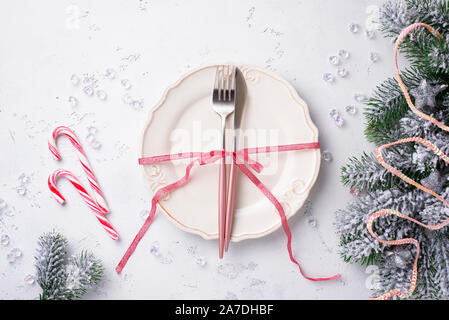 Christmas table setting and pink decor Stock Photo