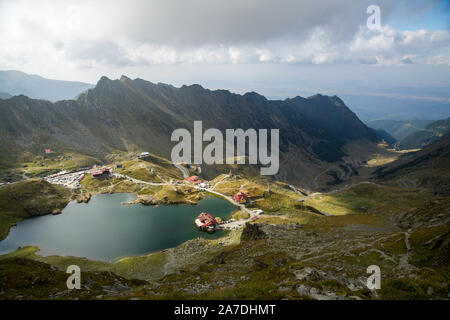 sunset view over balea lake and surroundings and transfagarasan road romania