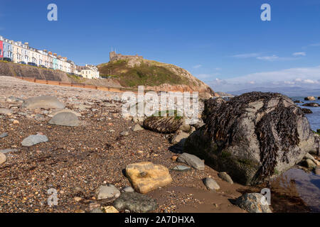 Criccieth castle and beach on the North Wales coast Stock Photo