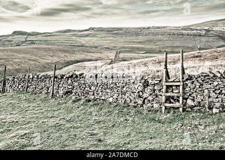 Scar End is a settlement on the side of Twistleton Scar in the English county of North Yorkshire. It is surrounded by Ingleborough and Whernside 2 of Stock Photo