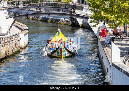 Traveling in a Moliceiro, Traditional boats in Aveiro, Portugal Stock Photo