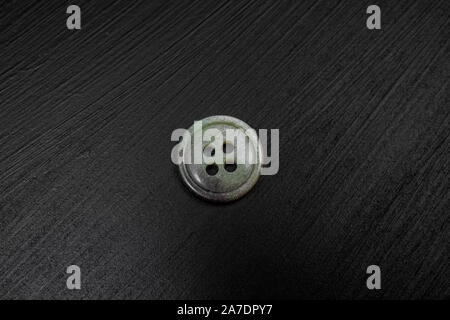 Vintage sewing buttons collection on black background Stock Photo