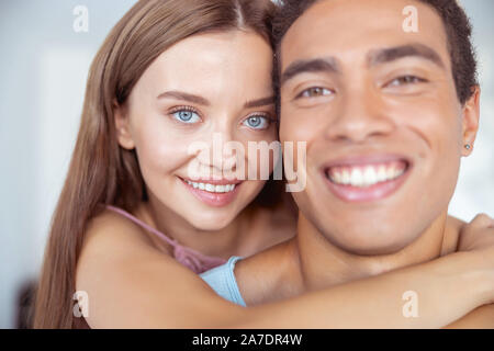 Joyful young man looking straight at camera Stock Photo