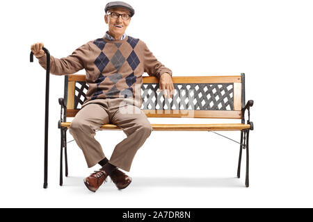 Full length shot of a happy senior gentleman sitting on a bench isolated on white background Stock Photo