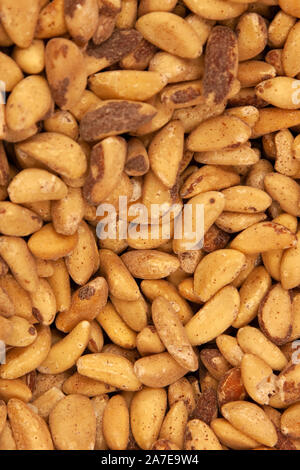 dark and light brown colored roasted brazil nuts Stock Photo