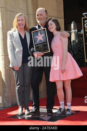 LOS ANGELES, CA - MARCH 13, 2015: Actor Ed Harris & wife Amy Madigan & daughter Lily on Hollywood Boulevard where he was honored with the 2,546th star on the Hollywood Walk of Fame. © 2015 Paul Smith / Featureflash Stock Photo