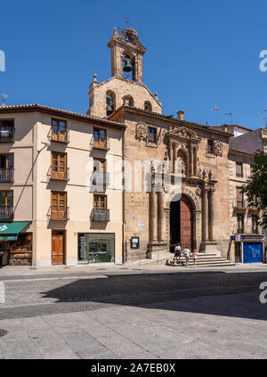 Salamanca, Spain - 15 August 2019: Tourists pass the entrance to St Martin's church in Salamanca Stock Photo