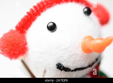 Adorable closeup profile of smiling snowman Stock Photo