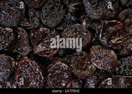food background from prunes texture, dry fruit closeup Stock Photo