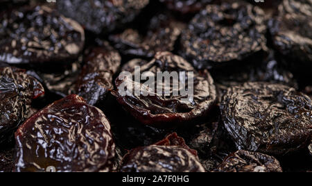 food background from prunes texture, dry fruit closeup Stock Photo