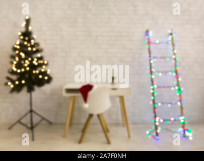 Christmas Office interior with pine tree, workplace and ladder Stock Photo