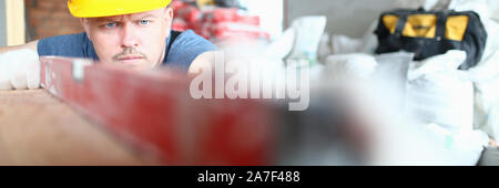 Concentrated professional with hard gloves Stock Photo