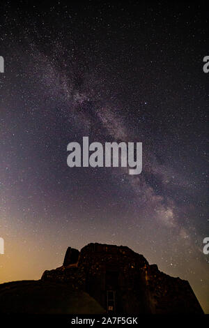 Milky way over the Jubilee tower, Moel Famau, Clwydian Range, North Wales Stock Photo