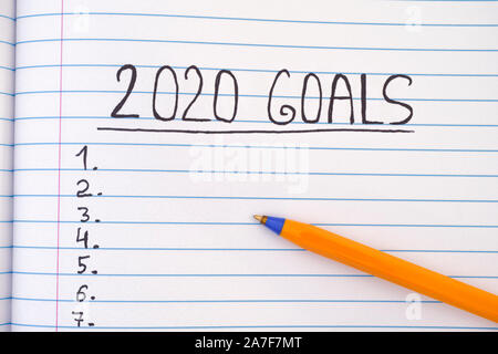 2020 goals list on notebook sheet. Close up. Stock Photo