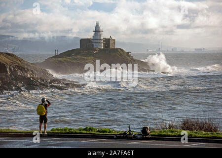 Swansea, UK. 02nd Nov, 2019. Huge waves smash into the rocks at Mumbles lighthouse near Swansea this morning. The waves were generated by the stormy weather which battered South Wales last night. Credit: Phil Rees/Alamy Live News Stock Photo