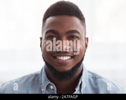 Closeup portrait of happy handsome african american man Stock Photo