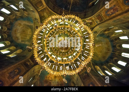 Bottom view of the large round chandelier in the center of St. Alexander Nevsky Cathedral in Sofia, Bulgaria Stock Photo