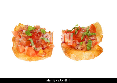 Tomato and red onion bruschetta on ciabatta bread isolated against white Stock Photo