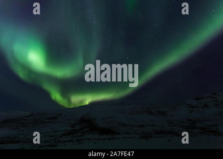 The Northern Lights, Aurora Borealis, seen neat Tromsø in Northern Norway Stock Photo