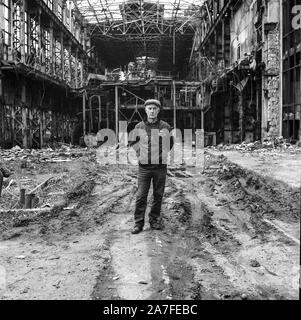 Portrait of a security guard at a derelict power factory site in Tkvarcheli in the unrecognised country of Abkhazia Stock Photo