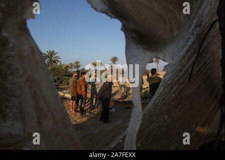 Khan Younis, Gaza. 02nd Nov, 2019. Palestinian men walks among greenhouses damaged by an Israeli airstrike launched, in Khan Yunis in the southern Gaza Strip on November 2, 2019. Dozens of strikes hit the Palestinian enclave in the early hours today. a security source in Gaza said. Photo by Ismael Mohamad/UPI. Credit: UPI/Alamy Live News Stock Photo
