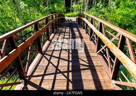 Snowmass village town in Aspen at Brush Creek trail in Colorado downtown with empty wooden bridge closeup and nobody in summer view Stock Photo