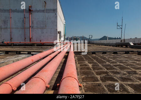 Pipes on a rooftop office block in Hong Kong Stock Photo