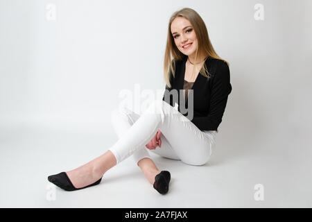 Woman face close up portrait. Young female model poses. - SuperStock