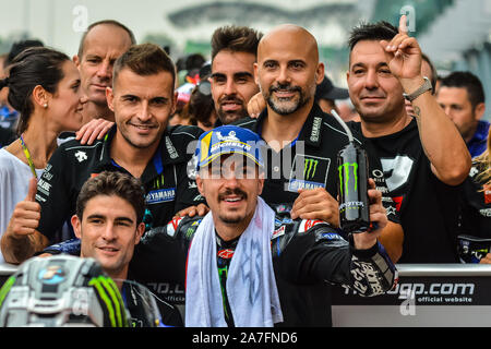 Sepang, Selangor, MALAYSIA. 2nd Nov, 2019. MAVERICK VINALES of MONSTER ENERGY YAMAHA MOTOGP poses for a picture with his team during the Qualifying Session of the 2019 Shell Malaysia Motorcycle Grand Prix at Sepang International Circuit outside of Kuala Lumpur. He will start second on the grid for Sunday's race. Credit: Fuad Nizam/ZUMA Wire/Alamy Live News Stock Photo