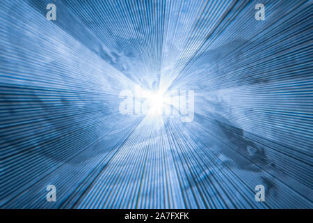 abstract blurred blue background with diverging light rays - laser strobe in smoke Stock Photo