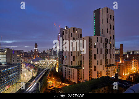 Manchester skyline, new build modern apartments 1 Cambridge St, and Oxford Road railway station along Whitworth Street Stock Photo