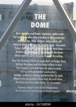 An inscription called 'The Dome' by Michael Longley is engraved in one of the panels of the geodesic dome at Belfast's Victoria Gate shopping centre. Stock Photo