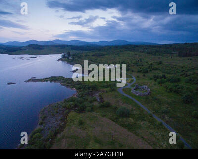 Aerial of Loch Doon Castle - which used to be on an island in the middle of the loch, though was rebuilt on the shore - Ayrshire Scotland UK Stock Photo