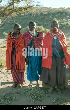 MTO WA MBU ,TANZANIA-MAY 14: African women of Masai Mara tribe village smiling,review of daily life of local people,near Serengeti National Park Stock Photo