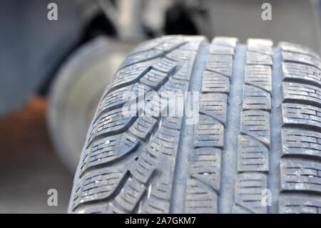 Car tires. Winter European tires for car. Wear. Wheel tread pattern. Stock Photo
