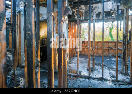 Burned home after fire the parts of the house after burnning Stock Photo