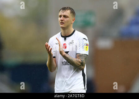 Wigan, UK. 02nd Nov, 2019. Ben Wilmot of Swansea City celebrates the win at the end of the game. EFL Skybet championship match, Wigan Athletic v Swansea city at the DW Stadium in Wigan, Lancashire on Saturday 2nd November 2019. this image may only be used for Editorial purposes. Editorial use only, license required for commercial use. No use in betting, games or a single club/league/player publications. pic by Chris Stading/Andrew Orchard sports photography/Alamy Live news Credit: Andrew Orchard sports photography/Alamy Live News Stock Photo