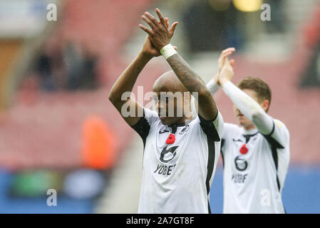 Wigan, UK. 02nd Nov, 2019. Andre Ayew of Swansea City celebrates the win at the end of the game. EFL Skybet championship match, Wigan Athletic v Swansea city at the DW Stadium in Wigan, Lancashire on Saturday 2nd November 2019. this image may only be used for Editorial purposes. Editorial use only, license required for commercial use. No use in betting, games or a single club/league/player publications. pic by Chris Stading/Andrew Orchard sports photography/Alamy Live news Credit: Andrew Orchard sports photography/Alamy Live News Stock Photo