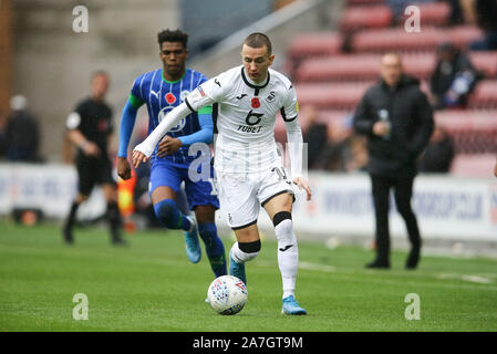 Wigan, UK. 02nd Nov, 2019. Bersant Celina of Swansea City makes a break. EFL Skybet championship match, Wigan Athletic v Swansea city at the DW Stadium in Wigan, Lancashire on Saturday 2nd November 2019. this image may only be used for Editorial purposes. Editorial use only, license required for commercial use. No use in betting, games or a single club/league/player publications. pic by Chris Stading/Andrew Orchard sports photography/Alamy Live news Credit: Andrew Orchard sports photography/Alamy Live News Stock Photo